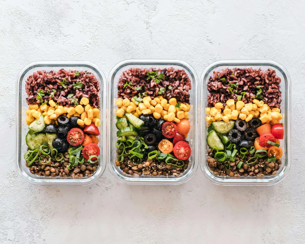 Healthy meal prep containers showcasing how to eat healthier, by Dream Life Space.